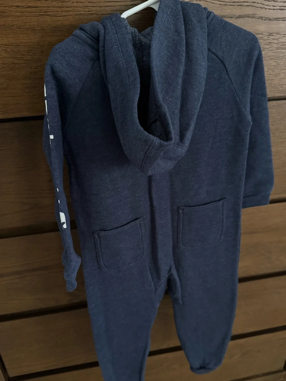 Two Carhartt Kids Hooded Zip One-Pieces in Carhartt Brown and dark navy